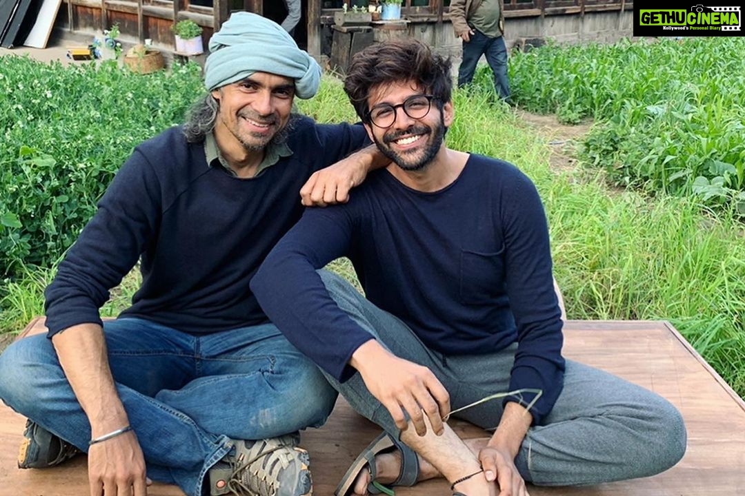Kartik Aaryan Instagram - When you first dream of being in films, you act in front of the mirror and nail it every time, and the world of movies seems magical.
Then you get a movie. You see the camera and are unnerved. It’s bigger than the suitcase you brought to Mumbai. The bright lights seem to be scolding you for not landing on a one inch tape mark and wasting everyones time. The first few years become about trying not to look nervous.
Then you get an Imtiaz Ali movie. The moment he narrates the story, you are pulled into a dream. I don’t even remember seeing the camera on his set, he‘d always be standing wherever I looked after cut. He was never at the monitor, he was by my side. The lights on Imtiaz Ali’s set help you find those tape marks. I have never experienced the kind of love and appreciation I have got for my performance in Love Aaj Kal, and that too from some of my favourite filmmakers and people I most respect in the industry. How ironic that the making of this film felt most effortless! It would scare me to think of doing two characters in one movie. And here, I didn’t even realise how smoothly I was being transitioned between #Veer and #Raghu . For an actor, there is no better environment than being In front of that mirror. Imtiaz Ali takes you there. This is the reason why so many great actors’ greatest performances have been in Imtiaz Ali films. Imtiaz Ali director nahi hain, jadugar hain! Thank you sir for giving me the best performance of my career yet. ❤️ @imtiazaliofficial #LoveAajKal