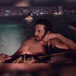 Kartik Aaryan Instagram - Midnight Swim.. Finally some time to chill 🍟🥤 Singapore views 😍 @marinabaysands