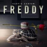 Kartik Aaryan Instagram – Slow And Steady Wins The Race 🙂
Be ready to enter the world of #Freddy 🖤
First look Aa raha hai 🐢

@disneyplushotstar @alayaf @ghoshshashanka @ektarkapoor @shobha9168 @jayshewakramani @ipritamofficial 
@bhavinisheth  @kamera002 #Parveezshaikh @aseemarrora @kamil_irshad_official @balajimotionpictures @nlfilms.india @nh_studioz @tips @kumartaurani @gauravbose_vermillion @praveenkaushal08 @houseofaweindia