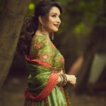 Madhuri Dixit Instagram - Into the wild! #jhalakdikhlajaa #photooftheday #tuesday #tuesdayvibes #green #ethnic #photoshoot #shootdiaries #lehenga