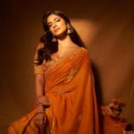 Malavika Mohanan Instagram – Happy Dussera 🧡

📸 @tejasnerurkarr 
Styled by @styled_by_meera @tryagaintoobad
Makeup @makeupbyanighajain 
Hair @hairstylist_madhav2.0
Outfit @punitbalanaofficial
Jewelry @the_jewel_gallery
@aquamarine_jewellery
@isharya 
PR @theitembomb