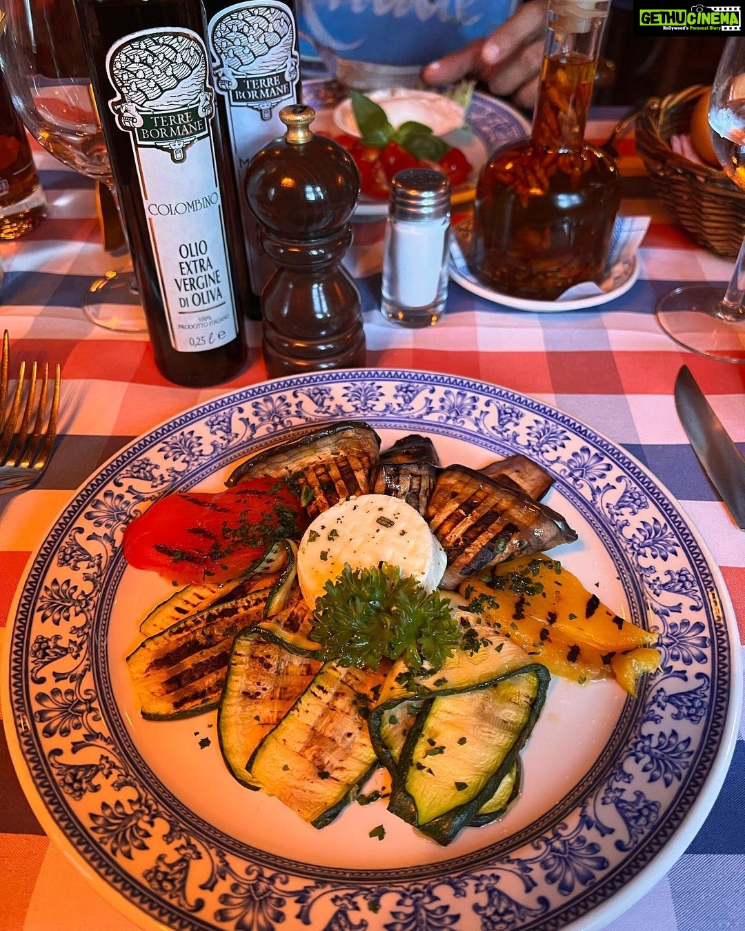 Mira Rajput Instagram - Dinner date with Amore Mio ❤️ Chesa Veglia is supposed to be one of the best restaurants in St Moritz, but what stood out for me wasn’t just how simple yet delicious the food was, but the way the atmosphere just enveloped us into Italian warmth and hospitality. Rustic atmosphere, wooden interiors and low ceilings take you back to a time where you may have wanted to belong. My favourite was the Pizza with Brie that I just couldn’t stop eating (crawled onto Shahid’s plate too). And I’m so glad the hotel wasn’t far because girl, these boots are not meant for walking. @badruttspalace #travelgram #itraveltoeat Restaurant-Bar Chesa Veglia