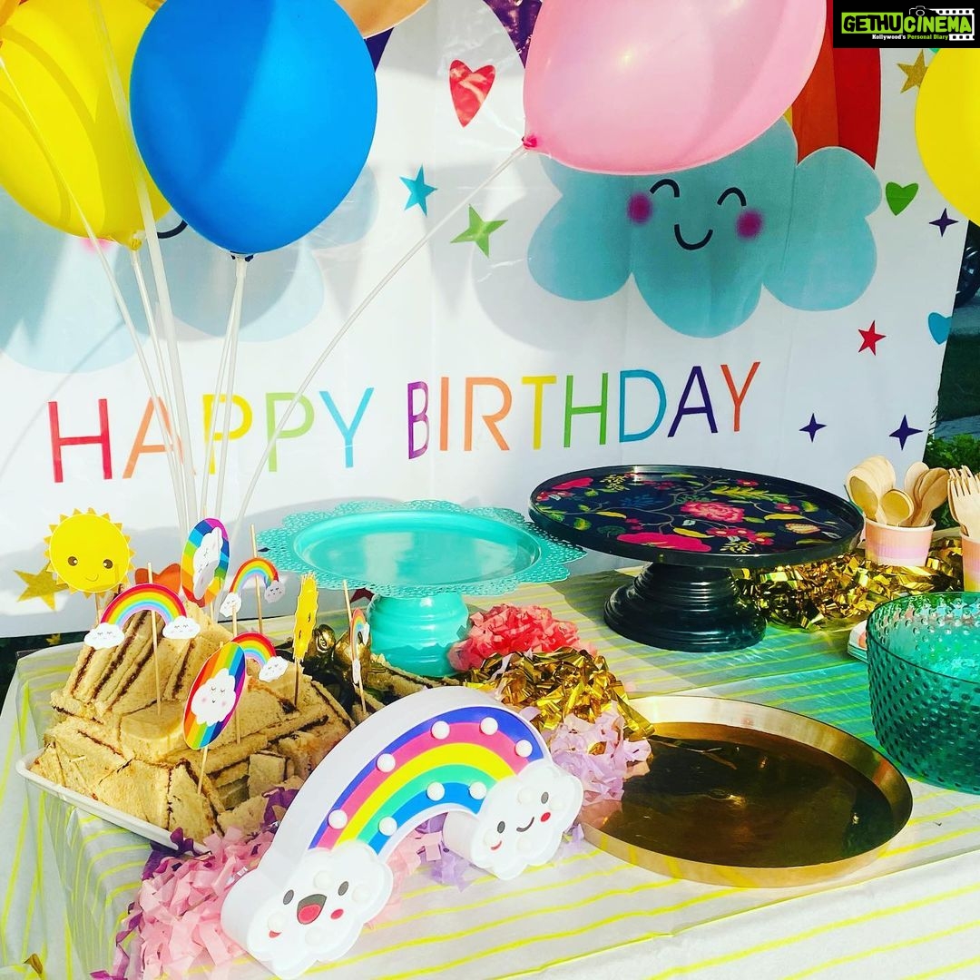 Mira Rajput Instagram - Life in Technicolour 🌈 This year M’s birthday was all about rainbow, bright colours, and less complicated decor! Last year I was super excited to be a DIY party planner. Two birthdays and a year later, all I can think of is arriving at the birthday like a guest! I reduced the decor fuzz and switched it with fun lights instead that were easier to handle and use in many ways (and later too). I picked up a fresh set of theme specific rainbow plates and napkins for cake from @partyalacarte17 and stuck to the bamboo ones for party grub. And I found a super convenient website @thememypartyofficial that delivers very well priced theme specific party supplies including straws, sandwich toppers, the backdrop, paper lanterns and colour coordinated balloons. We had popcorn from the popcorn containers leftover from last year and the rest of the snacks laid out for kids to dig in in mix-n-match crockery. My mom made her signature sandwich house: how many of you had them at your birthdays in the 90s? I always lay out the table before the party itself so there’s less madness later. I love this table cover from @thewishingchair and the crockery from this set (not used here) is equally lovely. The rainbow fringe, rainbow wrapping and a devilishly convenient balloon machine was from @amazondotin. Ofcourse the alphabet lights from @dohremico brought it all together (and I’ve ordered an extra Z & N so we can make a Zain out of the Misha 😋) along with the most fun prizes and party favours. Dog & the bone, Lemon spoon race and treasure hunt for all ages was too much fun. I think the adults enjoyed it a lot more than the kids. The cake was DIVINE. Vanilla cake with chocolate mousse filling instead of buttercream on a custom order @the_kitchenette_jalandhar I’d love to know how you all are celebrating kiddie birthdays cause I am ready to retire and I have another one in 4 days!