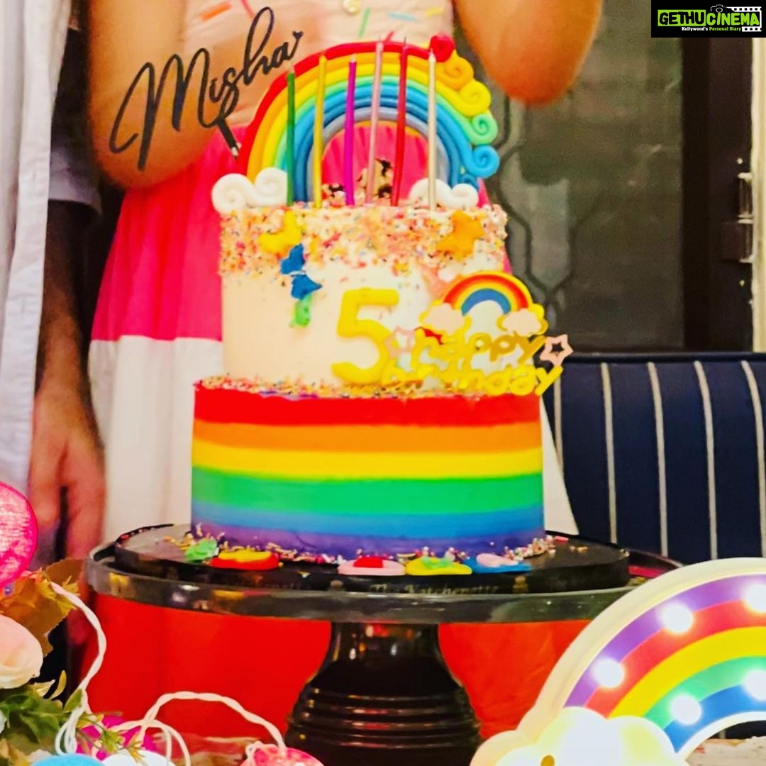 Mira Rajput Instagram - Life in Technicolour 🌈 This year M’s birthday was all about rainbow, bright colours, and less complicated decor! Last year I was super excited to be a DIY party planner. Two birthdays and a year later, all I can think of is arriving at the birthday like a guest! I reduced the decor fuzz and switched it with fun lights instead that were easier to handle and use in many ways (and later too). I picked up a fresh set of theme specific rainbow plates and napkins for cake from @partyalacarte17 and stuck to the bamboo ones for party grub. And I found a super convenient website @thememypartyofficial that delivers very well priced theme specific party supplies including straws, sandwich toppers, the backdrop, paper lanterns and colour coordinated balloons. We had popcorn from the popcorn containers leftover from last year and the rest of the snacks laid out for kids to dig in in mix-n-match crockery. My mom made her signature sandwich house: how many of you had them at your birthdays in the 90s? I always lay out the table before the party itself so there’s less madness later. I love this table cover from @thewishingchair and the crockery from this set (not used here) is equally lovely. The rainbow fringe, rainbow wrapping and a devilishly convenient balloon machine was from @amazondotin. Ofcourse the alphabet lights from @dohremico brought it all together (and I’ve ordered an extra Z & N so we can make a Zain out of the Misha 😋) along with the most fun prizes and party favours. Dog & the bone, Lemon spoon race and treasure hunt for all ages was too much fun. I think the adults enjoyed it a lot more than the kids. The cake was DIVINE. Vanilla cake with chocolate mousse filling instead of buttercream on a custom order @the_kitchenette_jalandhar I’d love to know how you all are celebrating kiddie birthdays cause I am ready to retire and I have another one in 4 days!