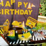 Mira Rajput Instagram - Another Quarantine Birthday 🎂 After planning a detailed, game intensive and theme-packed birthday for the lady of the house, I was quite lazy to get up and do yet another one in ten days! But nothing like Pinterest and good old mom-guilt to get you right back on your toes to start all over again. Buddy boy is obsessed with anything that goes vroom: trucks, bikes, tractors, cars, fire engines and his most favourite the JCB Digger. You can catch him in the hot summer afternoon playing with his trucks in the mud totally and utterly in a state of bliss. So this theme combined his love for both vehicles and construction (also because it was just easier to widen the theme basket a bit and I was in love with the tractor shaped napkins😜) I used whatever creativity I had left to deck up the place and inflated a pool for the entertainment. All parents know that nothing keeps kids engaged longer than a pool with a side of fries. A trunk full of cars, my decoration box and the cutest printables made the whole theme come together. I managed to get the backdrop online along with the pun-intended signboards. Caution tape and digger toothpicks brought the whole theme together. I forgot to click a picture of the returns which was my favourite go-to wrapping; newspaper with caution tape wrapped all around. We reused the tassels from last time and kept theme colours to match the decor. I found that going for a solid coloured plate with themed napkin makes for a smarter solution. If you have extra leftover, you can use it for another celebration, dressed with a different napkin. By the time the sun went down, the kids were famished and happily exhausted, so it was a quick scurry around the table before the Khoi bag popped and confetti laden kids were off! This one was quick and easy! I’m sure all you Mum’s know those two words are GOLDEN when it comes to a birthday!