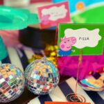 Mira Rajput Instagram - Quarantine Birthday 🎂 My kids’ birthdays are ten days apart and I had this dreamy idea when my son was born, that I’d combine their parties for as long as Khoi bags are interesting, and save myself the stress and planning that goes into kiddie parties. Because really, the unnecessary bar has been set quite high by too many, and some of them can be as tedious as weddings. And when better to economise on stress than during this time. Missy however had another plan in mind and complained to Papa that she wants a birthday of her own and doesn’t want to share her special day.. We caved and melted. For Misha, nothing tops Peppa. But instead of a full blown Peppa Fest, we made it kind of a technicolour carnival with bits of the lovable piggy. The decorations were all made by us and the fam (the DIY ones you get online) while watching some Netflix, as well as some I saved from her first birthday. The backdrop was a hand-me-down from my neice’s Peppa fiesta and cute printables brought the whole theme together from @studio_psd @printsolutionsdesign. It was so much fun, with musical chairs, a treasure hunt of weird Peppa erasers hidden all over in the garden, tug of war (Us vs the kids: no guesses on who won) and the good old Khoi bag. The menu must-have on my list was wafers and fruity along with the good ol’ party favourites that were pizza, noodles, Nutella sandwiches and jelly. It was all sorts of warm, fuzzy, and nostalgic! The kiddie birthday I always wanted to throw: intimate, full of memories and an after party mess 😜 ❤️🧡💛💚💙💜