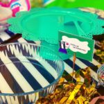 Mira Rajput Instagram - Quarantine Birthday 🎂 My kids’ birthdays are ten days apart and I had this dreamy idea when my son was born, that I’d combine their parties for as long as Khoi bags are interesting, and save myself the stress and planning that goes into kiddie parties. Because really, the unnecessary bar has been set quite high by too many, and some of them can be as tedious as weddings. And when better to economise on stress than during this time. Missy however had another plan in mind and complained to Papa that she wants a birthday of her own and doesn’t want to share her special day.. We caved and melted. For Misha, nothing tops Peppa. But instead of a full blown Peppa Fest, we made it kind of a technicolour carnival with bits of the lovable piggy. The decorations were all made by us and the fam (the DIY ones you get online) while watching some Netflix, as well as some I saved from her first birthday. The backdrop was a hand-me-down from my neice’s Peppa fiesta and cute printables brought the whole theme together from @studio_psd @printsolutionsdesign. It was so much fun, with musical chairs, a treasure hunt of weird Peppa erasers hidden all over in the garden, tug of war (Us vs the kids: no guesses on who won) and the good old Khoi bag. The menu must-have on my list was wafers and fruity along with the good ol’ party favourites that were pizza, noodles, Nutella sandwiches and jelly. It was all sorts of warm, fuzzy, and nostalgic! The kiddie birthday I always wanted to throw: intimate, full of memories and an after party mess 😜 ❤️🧡💛💚💙💜
