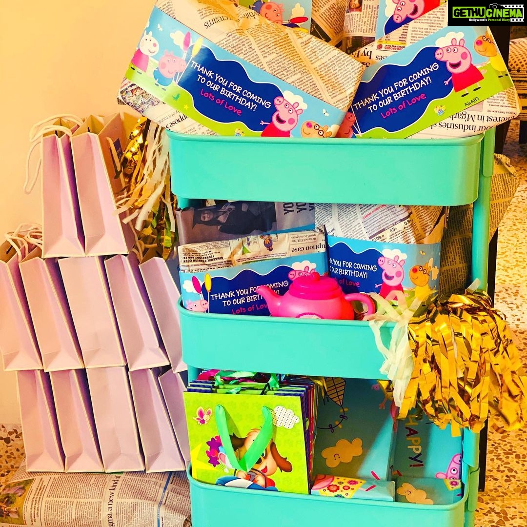 Mira Rajput Instagram - Quarantine Birthday 🎂 My kids’ birthdays are ten days apart and I had this dreamy idea when my son was born, that I’d combine their parties for as long as Khoi bags are interesting, and save myself the stress and planning that goes into kiddie parties. Because really, the unnecessary bar has been set quite high by too many, and some of them can be as tedious as weddings. And when better to economise on stress than during this time. Missy however had another plan in mind and complained to Papa that she wants a birthday of her own and doesn’t want to share her special day.. We caved and melted. For Misha, nothing tops Peppa. But instead of a full blown Peppa Fest, we made it kind of a technicolour carnival with bits of the lovable piggy. The decorations were all made by us and the fam (the DIY ones you get online) while watching some Netflix, as well as some I saved from her first birthday. The backdrop was a hand-me-down from my neice’s Peppa fiesta and cute printables brought the whole theme together from @studio_psd @printsolutionsdesign. It was so much fun, with musical chairs, a treasure hunt of weird Peppa erasers hidden all over in the garden, tug of war (Us vs the kids: no guesses on who won) and the good old Khoi bag. The menu must-have on my list was wafers and fruity along with the good ol’ party favourites that were pizza, noodles, Nutella sandwiches and jelly. It was all sorts of warm, fuzzy, and nostalgic! The kiddie birthday I always wanted to throw: intimate, full of memories and an after party mess 😜 ❤️🧡💛💚💙💜