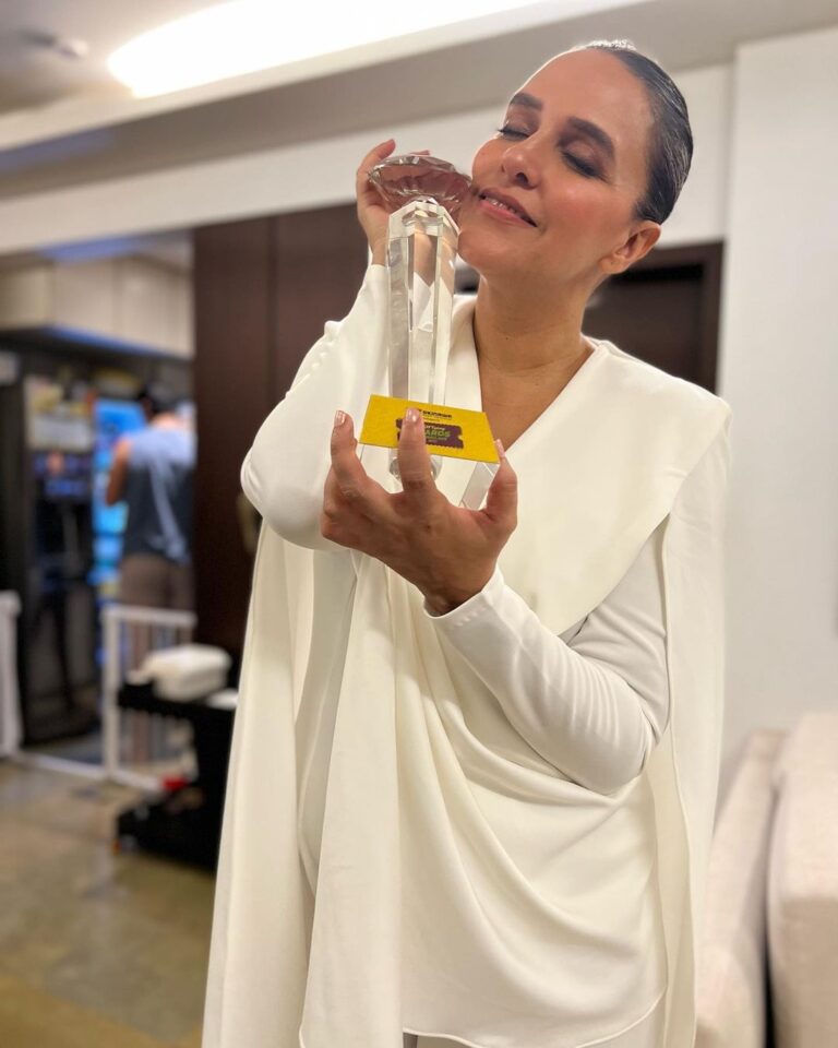 Neha Dhupia Instagram - The many moods of last night … my first ever award for #athursday … it’s impossible to win an award for best supporting actor without the support of the entire team! If it was nt for these brave men behind the film, the story , the screenplay there’s no way we would be able to weave such a strong narrative of having a baby in real and reel life together … Thankyou @behzu @alobo2112 for still letting me be your #CatherineAlvarez … thank you @ronnie.screwvala for not doubting us even for a second , thank you @pashanjal @yamigautam @atulkulkarni_official @ayeshakhanna20 team @rsvpmovies and team #athursday for making place for both of us 🤰 on set and in the script. Thank you #htottawards for recognising this effort at a time when women in cinema are doing such exceptional work and oh my goodness thank you ma pa ❤️ , my loving husband @angadbedi as I hold you closer and tighter than this trophy for all you do even if it is running away to the refrigerator right after every cuddle ( image 👉 10 😉) … this one’s for my baby girl who waited patiently for mama to come home after work and my baby boy who hung in there right till the end and never troubled mama on set!!! ♥️