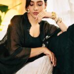 Neha Sharma Instagram - Another day, another slay… 👣🤍🖤 . . . Photography: @leroifoto Styling: @aeshah Shirt, trousers: @urvashikaur Top: @massimodutti Bracelets, rings: @myrhabyrhea Hair : @tejisinghofficial