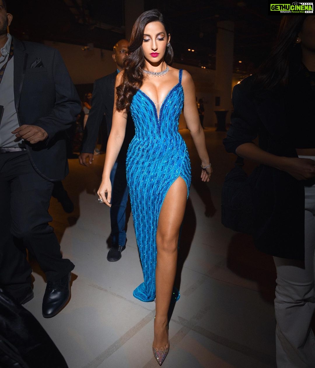 Nora Fatehi Instagram - Causing confusion, disturbing the peace, its not an illusion, we runnin’ the streets 🪬🧿 📸 @dirkalexanderphotography Dress: @michael5inco Jewellery: @diamantinafinejewels Heels: @louboutinworld Styled by @spacemuffin27 Assisted by @sabrinawhite98 @arshifarid Make up and Hair @marianna_mukuchyan Abu Dhabi, United Arab Emirates