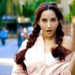 Nora Fatehi Instagram - Thappad se daarr nahi lagta, rejection se lagta hai! It’s time for some sweet revenge guys! Go out on the streets and ask the auto drivers, “England chalogay?” Confuse them and make an epic video and stand a chance to win an @amtouristerin champions edition luggage and get #YourAccessToTheWorld Hair makeup @zoya.makeupandhair Styling @vani2790
