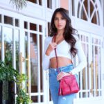 Nora Fatehi Instagram - Dont let this lovely handbag distract you from from the fact my tan is on fleek 😉 👜 @tods 🔥❤️ 📷 @mohamedsaadstudio ❤️ 🏨 @sofitelmarrakech _________________________________________________ #norafatehi #fashion #love #new #photography #photooftheday #tods #women #streetstyle #onfleek #mood #morocco #marrakesh #toronto #india #tods #fall #winter #shaunakbali