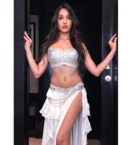 Nora Fatehi Instagram - Dripping in finesse.. it don’t make no sense 🔥❄️ 💎 🎶 #norafatehi #mood #work #lit #finesse #shinning #bright #cardib #love #winning #hairgoals #natural Photo credits @parulp28