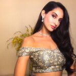 Nora Fatehi Instagram – Thank you @shazeindia for the lovely jewellery 💎 
Thank @marcepedrozo for the hair and makeup love you 😍😍 💄 
Thank you @kansalsunakshi for styling me 👗 
Lehenga by @chameeandpalak 😎🤩🔥❤️🎉👠
#wedding #season #norafatehi #mumbai #india #fashion #love #friends #celebration