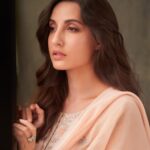 Nora Fatehi Instagram - I'm trying to just relate what I can see through my own eyes… And nothing tell the truth like the eyes will.. Lived so much for others, don't remember how I feel… Wearing: @ruwaa.design Ring: @abhilasha_pret_jewelry Styled by: @manekaharisinghani Styling Assistants: @gypsy.girl.world × @chintanshah_08 HMU: @reshmaamerchant × @marcepedrozo Shot by: @tejasnerurkarr