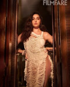 Nora Fatehi Instagram - It's a moment when I show up, got 'em sayin', "Wow" 🌪🧿

Photograph : Tejas Nerurkar (@tejasnerurkarr)
Stylist : Maneka Harisinghani (@manekaharisinghani) 
Makeup @savleenmanchanda 
Hair @marcepedrozo 
@filmfare