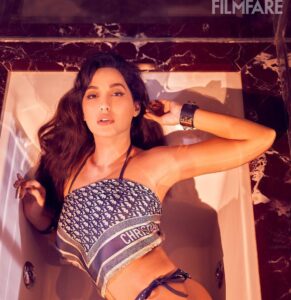 Nora Fatehi Instagram - This type shit have you wildin' .. 🧿🍭💙🧜🏼‍♀️

Wearing: @dior 
Photograph: @tejasnerurkarr
Styling: @manekaharisinghani
Hair: @marcepedrozo
Makeup: @savleenmanchanda
Filmfare Editorial: @anewradha @rahulgangs_ @sujithapai @analitaseth
Publicist: @idhyahmedia @sanchitatrivedi
Location: @tajlandsend