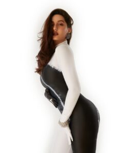 Nora Fatehi Instagram - Take a ride into the danger zone…🖤🧿

Bodysuit: @bloni.atelier
Rings: @zillionaire.india 
Earrings: @pipabella @rheakapoor rheakapoorxpipabella
@diosaparis

@sashajairam 
@chandiniw 
@marcepedrozo 
@savleenmanchanda 
@stacey.cardoz