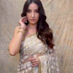 Nora Fatehi Instagram - Main hun teri mashooka✨✨ shoutout to @rakulpreet u look stunning in ur new song! Check it out guys! Beautiful sari by @manishmalhotra05 Styled @aasthasharma Makeup hair @marianna_mukuchyan 🎥 @stevenroythomas