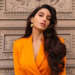 Nora Fatehi Instagram - You got to keep me focused, you want it, say so (yeah)... 🧡🧡 @versace @ysl @dirkalexanderphotography @marcepedrozo @jodyvgstylist