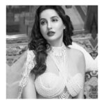 Nora Fatehi Instagram - Ancient Indian texts say the pearl was born when the Earth's Waters and Heaven's powers, mingled with a bolt of lightning. The Divine lustre and ethereal simplicity of pearls and crystals combine in this embroidered collared blouse to create a sensual masterpiece of bejewelled beauty. @abujanisandeepkhosla Abu Jani Sandeep Khosla for Nora Fatehi. Photographer: @virajnayar HMU: @namratasoni . . . #abujanisandeepkhosla #norafatehi #pearl #blouse #crystals #collar #organza #dakhai #kamdani #saree #resham #mandala #sequins #embroideries #textiles #textilesofindia #fashion #original #classic #techniques #fashionforwomen #luxury #couture #madeinindia #indiafantastique #abujani #sandeepkhosla