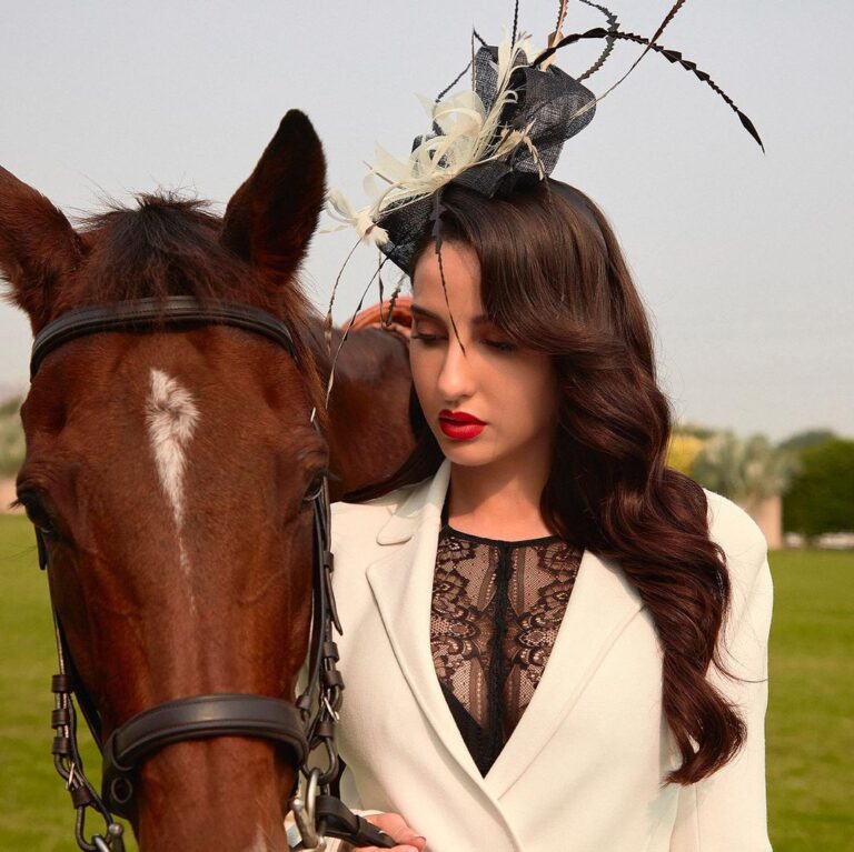 Nora Fatehi Instagram - The horse, with beauty unsurpassed, strength immeasurable and grace unlike any other, still remains humble enough to carry a man upon his back..... Stay humble guys ❤️🤎 Wearing @herveleger × @viangevintage × @delna_poonawalla Bag- @cultgaia Styling Asst @gypsy.girl.world @faisalbhattiofficial HMU @marcepedrozo Shot by @tejasnerurkarr