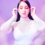 Nora Fatehi Instagram - Play, come on play my song Play it all night long Just turn it up and turn me on 🍬🦄💜 @herveleger × @louboutinworld × @manekaharisinghani @marcepedrozo Styling asst @gypsy.girl.world × @faisalbhattiofficial Shot by @tejasnerurkarr