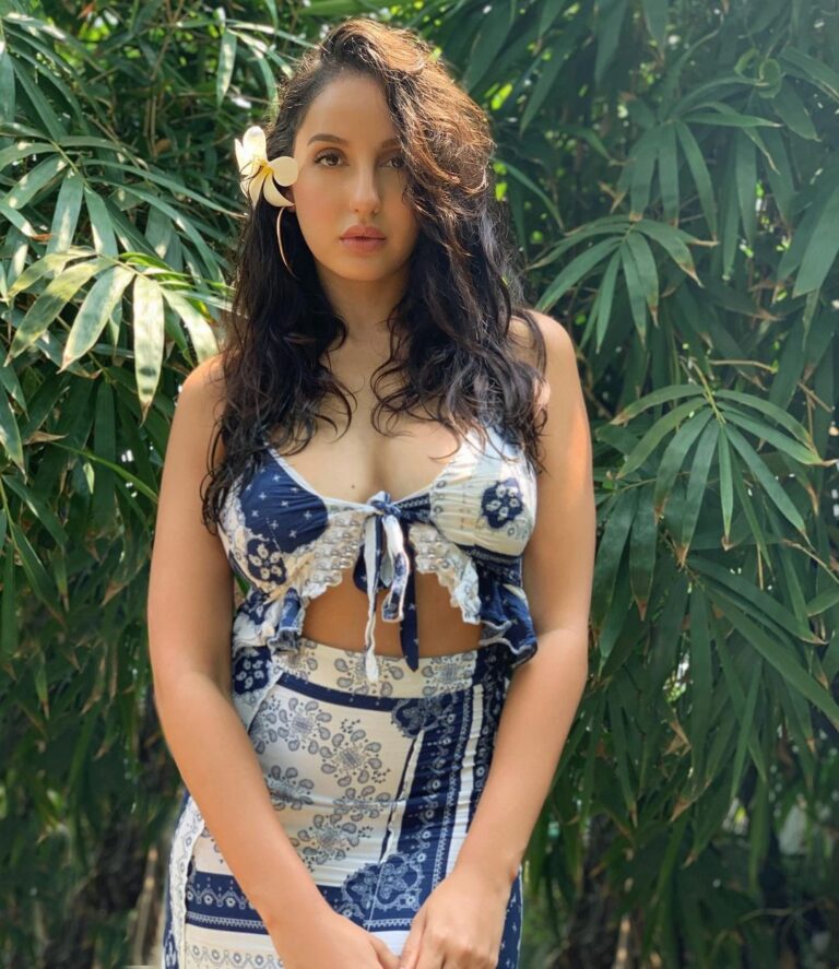 Nora Fatehi Instagram - Tropical the island breeze All the nature wild and free This is where i long to be La isla bonita 🌴🌸🐚 🧿