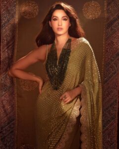 Nora Fatehi Instagram - 💥💥 @faabiianaofficial Emerald necklace: @goenkaindia Rings: @roopavohrafinejewellery Creative Direction, Set Design & Styling: @manekaharisinghani Assisted by: @gypsy.girl.world HMU: @namratasoni Shot by: @tejasnerurkarr