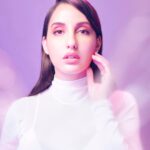 Nora Fatehi Instagram - Straight into ur soul.. 🍭🍬 @herveleger × @louboutinworld × @manekaharisinghani @marcepedrozo Styling asst @gypsy.girl.world × @faisalbhattiofficial Shot by @tejasnerurkarr