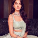 Nora Fatehi Instagram - Blessed 💫 Magazine: @weddingvows.in Produced by: @maximus_collabs_ Photographed by: @kadamajay Styling by: @shnoy09 @houseofneetalulla Hair and makeup: @kyana.emmot Asst : @shresh_mua Jewellery: @binnys.world Location Partner: @hyattregencymumbai Nora Fatehi Publicist - Sanchita Trivedi @sanchitatrivedi, IDHYAH @idhyahmedia Team Wedding Vows: @NadiiaaMalik
