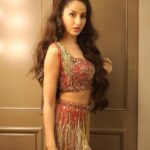 Nora Fatehi Instagram - Stepped into 2020 with good hair and a cute face 😉 Happy new year guys! Hope u enjoyed my performance last night ❤️🔥#ExtraAF2020 HMU @marcepedrozo Outfit @suzan1304 📷 @anups_