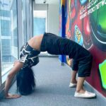 Nyla Usha Instagram - It's Yoga day... This year, I have upgraded to a (not so perfect ) Chakrasana from the tree pose. > >swipe>> Thanks to the bird I flock with😃