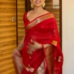 Nyla Usha Instagram - My inner muse is happy seeing me in a saree. Always♥️ . . #saree #redsareelove❤️ #messybuns #dressingupisfun #abudhabicuty #friendscaptures