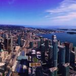 Rohit Suresh Saraf Instagram - View from the CN Tower, 1815 ft. high! . . . #cntower #cntowerview #cntowerclimb #cntowertoronto #view #skyscrapers #highrise #buildings #architecture #glass #reflections #dusk #travel #vsco #vscocam #vscodaily #toronto #torontolife #canada