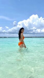 Sanjana Sanghi Instagram - Learning : don’t do what you suck at. Kindly enjoy me trip & almost fall into the ocean as I attempt the infamous “transition reel” ✌️☺️🧡