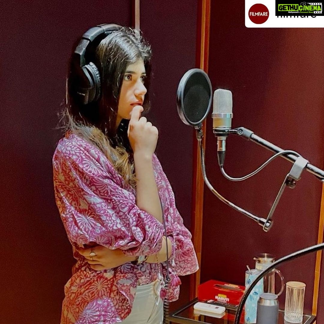 Sanjana Sanghi Instagram - That moment. That mic. That feeling of reliving & recreating each moment of what has been the most beautiful journey of my life yet. So, so many feelings. Thank you guys for being so excited yet so patient for #OMTheBattleWithin 🤍⏰ Our world will be yours, soon enough, promise. @adityaroykapur • @itskapilverma • @khan_ahmedasas • @apnabhidu • @zeestudiosofficial • @shariq_patel ______ Posted @withregram • @filmfare #SanjanaSanghi dubs for Om: The Battle Within. We can't wait to see her in their action-packed thriller!