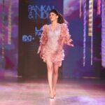 Sanjana Sanghi Instagram - My debut runway moment at @lakmefashionwk x @fdciofficial . Back in my hometown, Dilli. Adorning this holographic pastel lover’s dream by the most special @pankajandnidhi 💗- showcasing their most stunning collection “Marbella” A confluence of so many special moments. As a child of the stage, to get to be back on it, is an instant reminder that the exhilaration it comes with is absolute 🔥🔥 Fam & friends, thank you for coming out and celebrating this in the grandest way possible. My team, you guys are ♥️🌏 And to the epic Quirks of the town, @varunpratap_ @somyagoenka_ @quirk_india The runway bug may just have bitten hard. 🥰