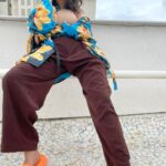 Shibani Dandekar Instagram - Current favs in fashion and music 🧡💙🤎 printed shirted by @dhruvkapoor pants by @deme_love_ white shirt by @deme_love_ @gabriellademetriades bodysuit by @skims sneakers by @asicsindia @viviennewestwood slides by @yeezymafia #toduntaak @theeevil @dubsharma