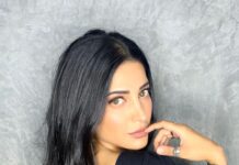 Shruti Haasan Instagram - 🐈‍⬛🖤🧿 put on your black dress and break shit ! 💋 . . . 💄 @devikajodhani 💇🏻‍♀️ @noori_hairstylist