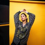 Tamannaah Instagram - Being expressive... being chic... being #BabliBouncer... isn't this androgynous look a vibe, guys? 💛 P. S. Whoever said boys shouldn't wear pink haven't seen @kapilsharma in a hot pink pullover. He was a whole mood on the sets of #TheKapilSharmaShow 💯 Keep defying the usual, Kapil 🙌🏼 Stylist: @stylebyami assisted by @anoooooshka Outfit: @dhruvkapoor Jewellery: @inezeofficial Hair: @hairbyseema Makeup: @meghnabutanihairandmakeup Shot by: @bharat_rawail