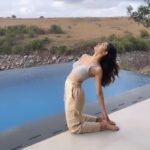 Tridha Choudhury Instagram - Let’s go !!! 🦋 Time to bend and breathe 🦋 Guess the asana 🦋 #internationalyogaday #yogaday #yogainnature #outdooryoga #yogafitness #breatheinbreatheout