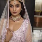 Tridha Choudhury Instagram - Just take deep breaths and believe in the Impossible 🤍 Wearing @reynutaandon 🤍 #bridalcouture #bridaljewellery #bridalfashion #bridallehenga #indianbrides