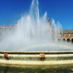 Varun Tej Instagram - Can any notice the rainbow by the fountain!..So beautiful! #shoot #mister #location #seville Plaza de España, Seville
