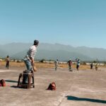 Vicky Kaushal Instagram – Making the most of an early pack up… Sneaking out some cricket time with the Film crew!!! Chair, patla, sandbags and a stick for the non stricker’s end… jugaad pro max. Mazze aa gaye!