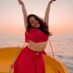 Wamiqa Gabbi Instagram – Floating far away into dreamland… ⛅️🚤 
#sunsets #oceanblues #ocean #waterbaby