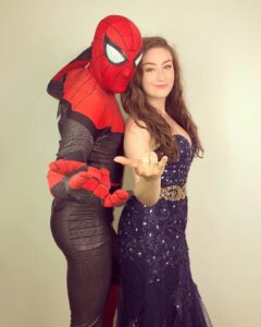 Amber Doig Thorne Instagram - With great pizza comes great responsibility 😂 Getting ready for Homecoming with my date 🕷 

#SpiderManFarFromHome is in cinemas tomorrow! 🍕

Which is your favourite Spider-Man movie? 🤔 🍿 😍

Dress - @jjshouseofficial 💞
@SonyPicturesUK @marvel_uk @spidermanmovie @PapaJohnsUK #PapaJohnsUK #ad