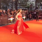 Amber Doig Thorne Instagram - I’m such a movie geek 🤓😍 I love curling up on the sofa & having a movie marathon 🙊 What’s your favourite film from 2019 so far? 🤔 . Here’s some fun pics from The King premiere I went to recently, also bumped into Timothee Chalamet on the red carpet - he’s such a sweetheart! 🥰🙈 . 📸 Photo taken at The King World Premiere ⭐️ . 👗 My gorgeous dress is from @malliny_mln 😍 Check out their page for more beautiful designs ❤️ . #theking #lff @britishfilminstitute #ambzdt @tchalamet #timotheechalamet #thekingpremiere