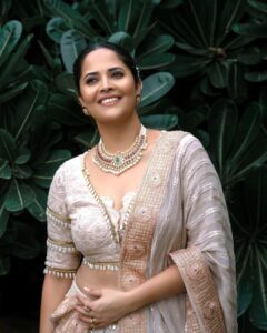 Anasuya Bharadwaj Instagram - Choose what helps your heart bloom 🤍🌸 For #SuperSingerJunior🎤🎶🎵 #GrandFinale #Tomorrow #Sunday #12pmOnwards Designed & Styled by : @rishi_chowdary Outfit by : @mithra.couture Jewels by: @lorifinejewellery PC: @krishnatejah Edits: @verendar_photography